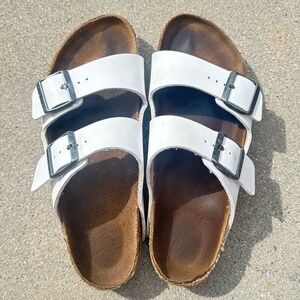 Birkenstock White Sandals with Black Buckles